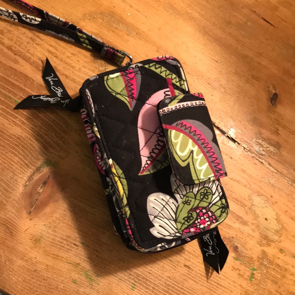 black and pink vera bradley wristlet.